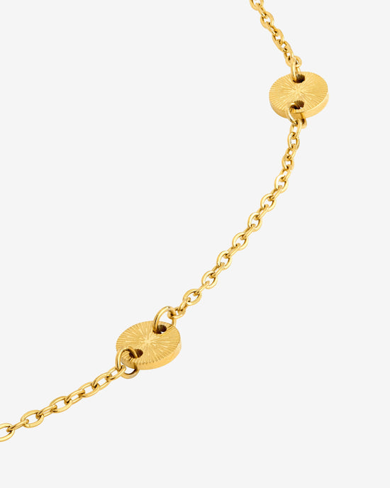 La Féminité Oro