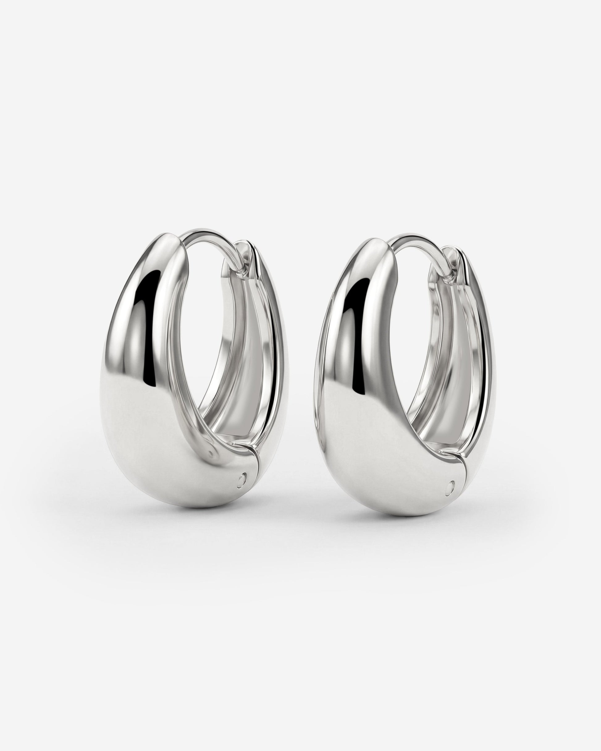 Gilded Curve Hoops Argento