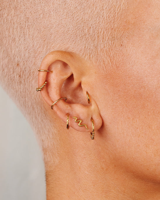 Snake Piercing Oro