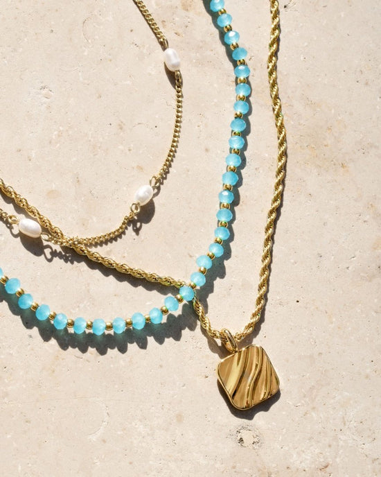 Pearl after Pearl Choker Oro