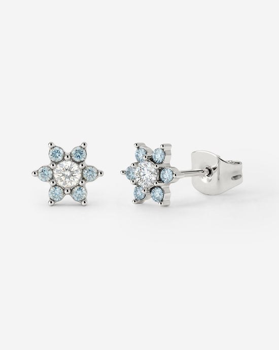 Orecchini a perno con petali blu scintillanti in Argento